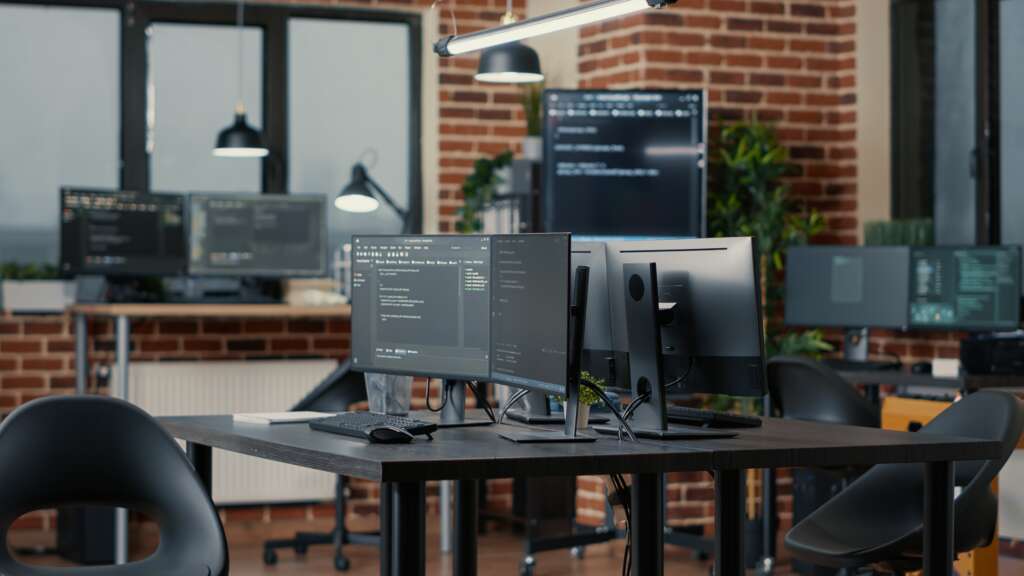 Computer Screens at a Table in office