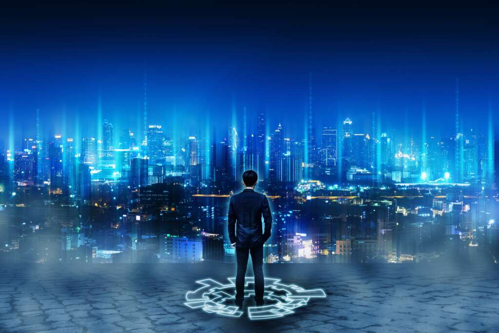 Business technology concept, Professional business man standing on future network city background at night with futuristic graphic