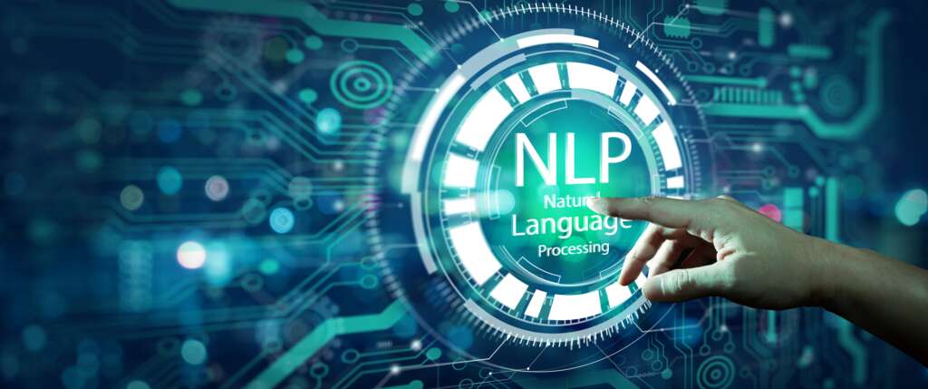 Hand of man touching NLP Natural Language Processing cognitive computing technology concept hologram screen.